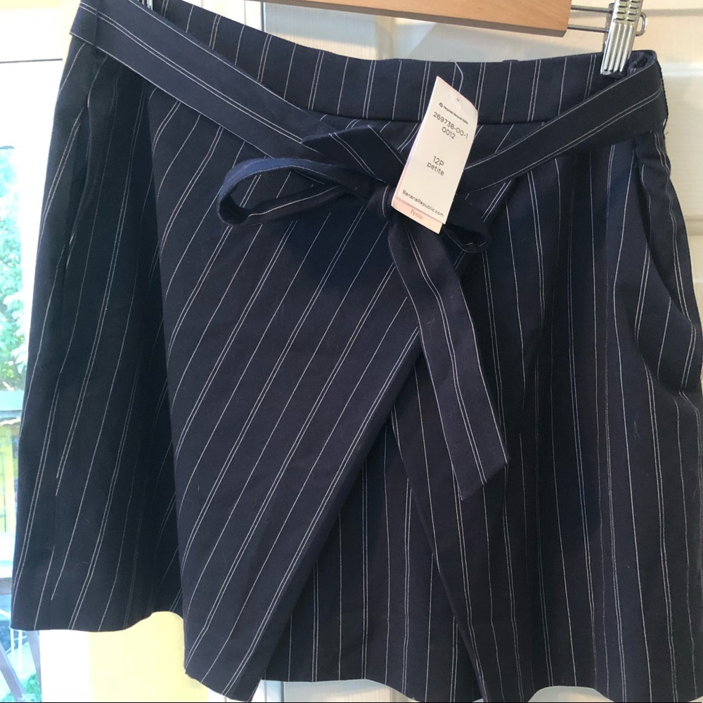 Short navy and white pin stripe skirt with pockets